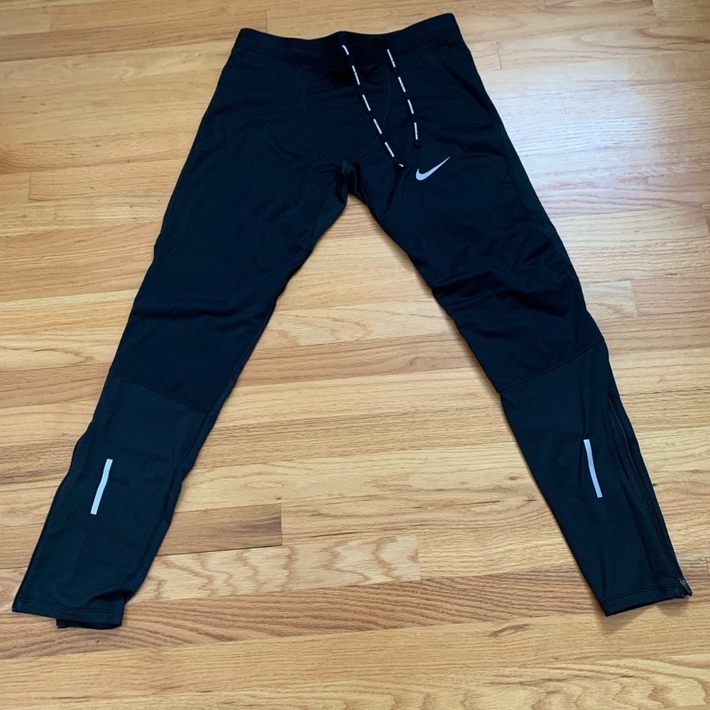 Nike Shield tights. Never worn. New condition.
